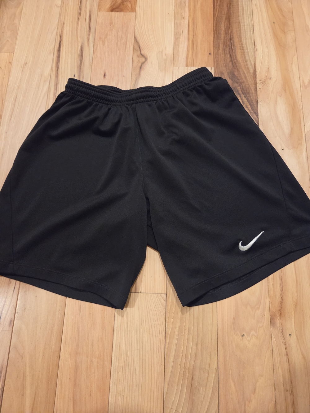 Nike Black Athletic Shorts with White Swoosh